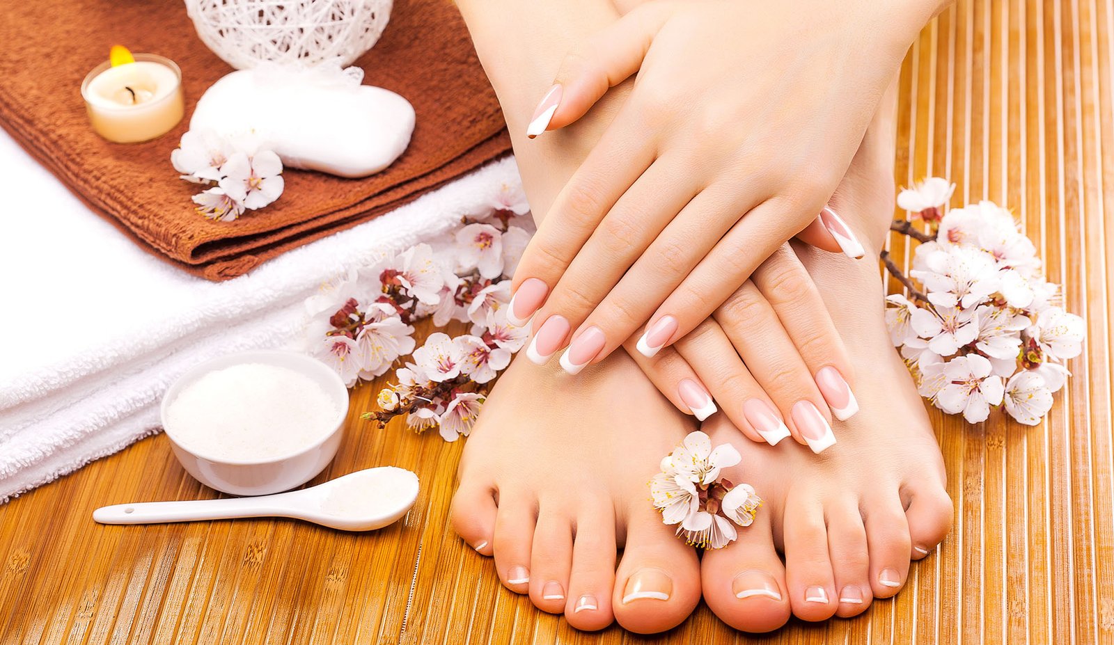 brown manicure and pedicure on the bamboo